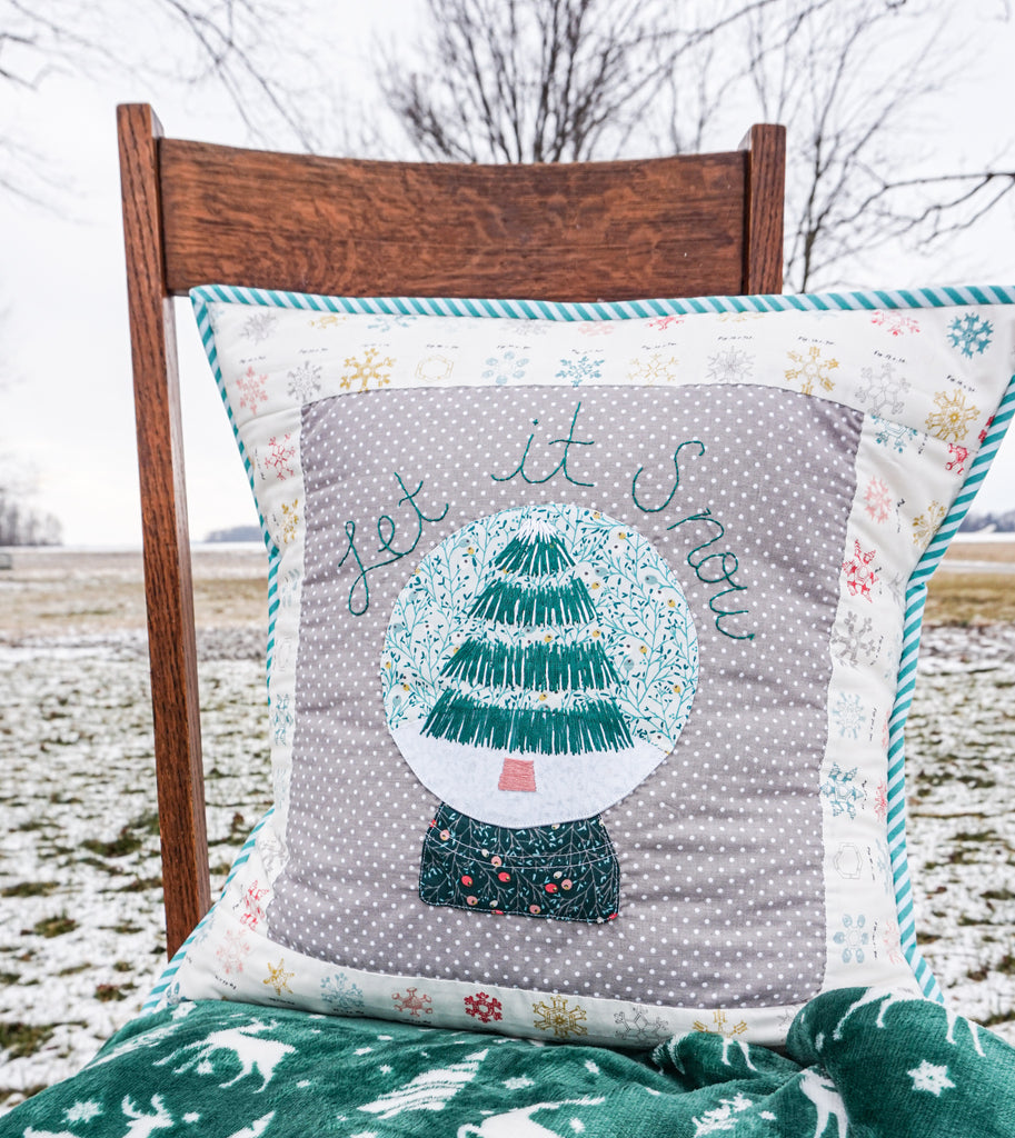 Let it Snow: A Winter Snowglobe Pillow with HeatnBond Interfacing