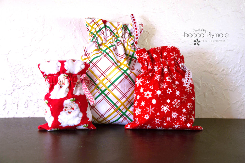 DIY Reversible Santa Bags using Heat N Bond Interfacing.