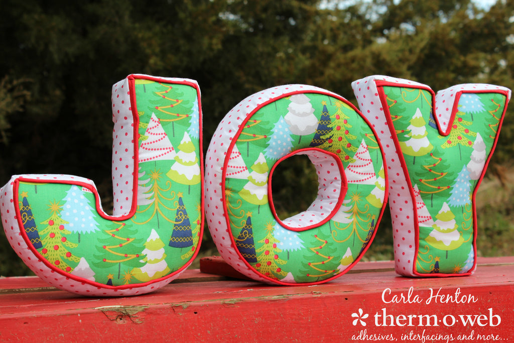 Joy Letter Pillows for Holiday Decor with HEATnBOND® Fusible Interfacing