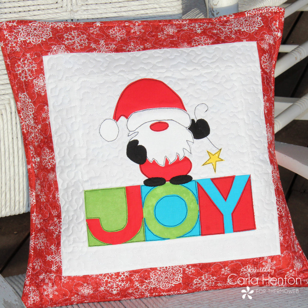 A Santa Gnome Pillow with HeatnBond is Joy!